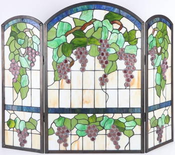 TIFFANY STYLE STAINED GLASS FIREPLACE SCREEN: Tiffany style stained glass fireplace screen grape vine design. Fireplace screen is beautifully done.Size: 31.5" x 41"Condition: Very Fine