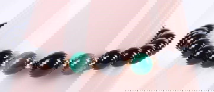 14K YELLOW GOLD ONYX MALACHITE UNISEX BRACELET: 14K yellow gold onyx malachite unisex bracelet.Stone Type: AssortedWeight: 8.60 GramsSize: 7.25"Condition: Very fine.