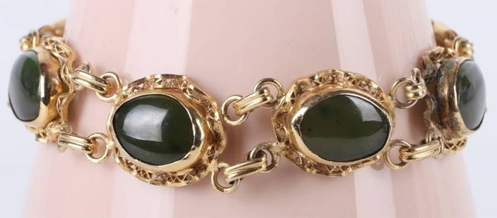ANTIQUE 9K GOLD FILLED JADE LINK BRACELET: Beautiful antique 9K gold filled jade link bracelet.Stone Type: JadeWeight: 16.38 GramsSize: 7.25"Condition: Very Fine