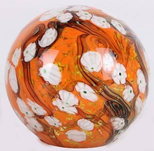 ART DECO MURANO ORANGE GLASS PAPERWEIGHT: Art deco Murano orange glass paperweight with black waves, millefiori decorationCondition: Very Fine