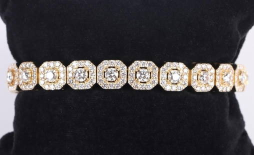 9.80CTW NATURAL & LAB DIAMOND 14K GOLD BRACELET: Elegant 14K yellow gold naturally formed diamond & lab created diamond bracelet to include twenty 0.25ct round faceted natural diamonds(TESTED) weighing 5.0ctw, and two hundred and forty 0.02ct round