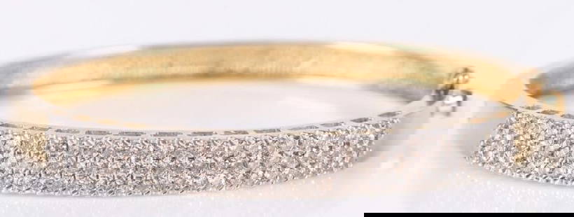 0.90CTW DIAMOND 14K WHITE & YELLOW GOLD BRACELET: 0.90CTW diamond 14K yellow and white gold bangle ladies bracelet with ninety 0.01CT round diamonds.Stone Type: DiamondWeight: 19.1 gramsSize: 7.5" lengthCondition: Very fine.