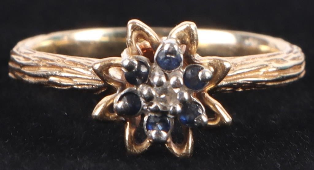 10K YELLOW GOLD DIAMOND TOURMALINE LADIES RING: 10k yellow gold diamond tourmaline ladies ring. With one 0.01ct round diamond and six 0.01ct round tourmalines. Stone Type: Assorted Weight: 2.30 Grams Size: US 4 Condition: Very fine.