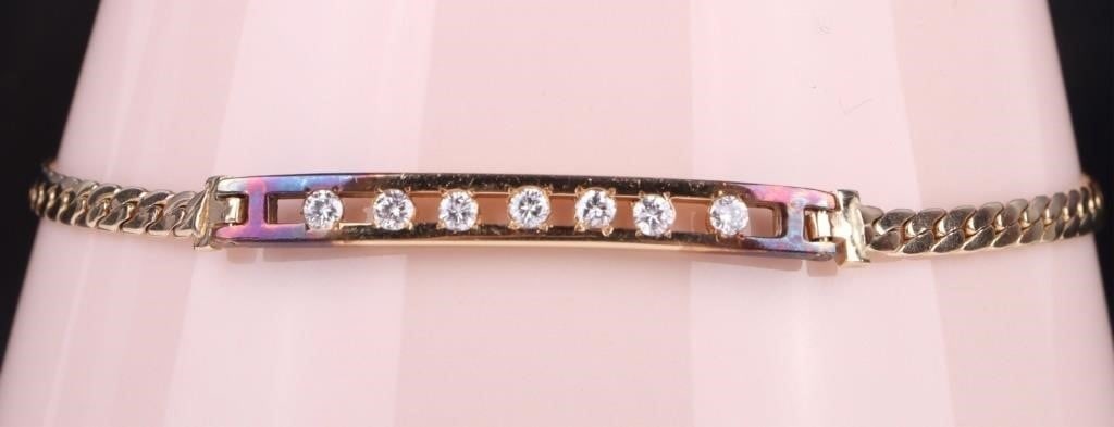 14K YELLOW GOLD DIAMOND LADIES BRACELET: 14k yellow gold diamond ladies bracelet with seven 0.05ct round diamonds. Stone Type: Diamond Weight: 6.3 Grams Size: 7.5" length Condition: Very fine.