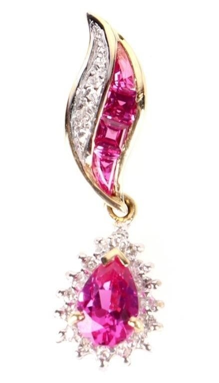 14K YELLOW GOLD SAPPHIRE DIAMOND LADIES PENDANT: 14k yellow gold sapphire diamond ladies pendant with one 0.40ct teardrop pink sapphire and four 0.02-0.03ct pink sapphire and eighteen 0.01ct round diamonds. Stone Type: Assorted Weight: 1.41 Grams Si