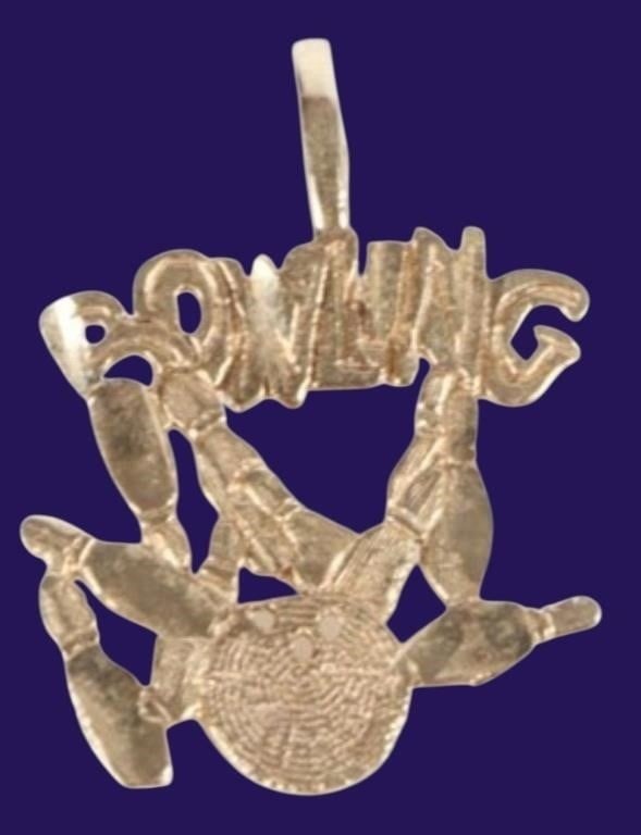 BOWLING BALL & PINS 14K YELLOW GOLD PENDANT: 14K yellow gold bowling ball & pins pendant. Condition: Very Fine