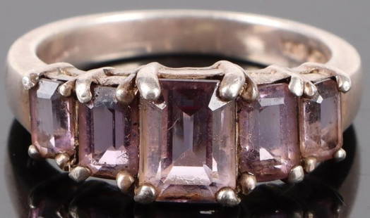 STERLING SILVER EMERALD CUT AMETHYST LADIES RING: Sterling silver emerald cut amethyst ladies ring to include: one 1.00ct emerald cut amethyst, two 0.30ct emerald cut amethyst, and two 0.20ct emerald cut amethyst gemstones.Stone Type: