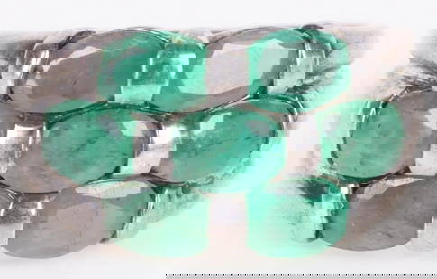 0.21CT OVAL EMERALD STERLING SILVER LADIES RING: 0.21ct oval emerald sterling silver ladies ring with seven 0.30ct oval emeralds.Stone Type: EmeraldWeight: 5.11 GramsSize: US 6.75Condition: Very fine.