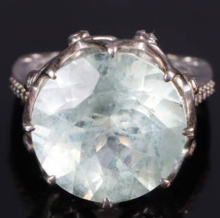 STERLING SILVER 16.67MM ROUND QUARTZ LADIES RING: Sterling silver 16.67mm round cut quartz ladies ring.Stone Type: QuartzWeight: 8.27 GramsSize: 7.25 U.S.Condition: Very fine.