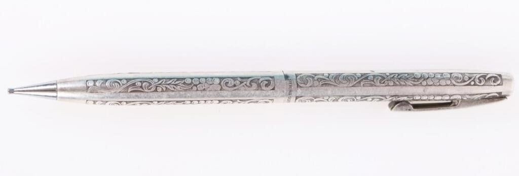ORNATE VINTAGE SHEAFFER STERLING SILVER PEN: Ornate vintage Sheaffer sterling silver pen. Weight: 19.3 grams Size: 5.0" length Condition: Not in working condition.