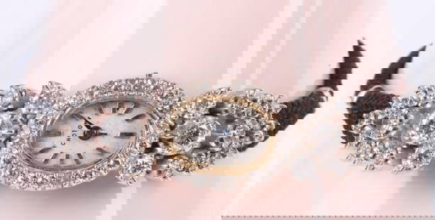 CROTON 14K WHITE GOLD DIMAOND LADIES WATCH 1.05CTW: Croton 14k white gold diamond ladies wristwatch. 17 jewels. Watch features two 0.15ct round diamonds, two 0.10ct round diamonds, four 0.05ct round diamonds, and twenty-seven 0.01-0.02ct round diamonds