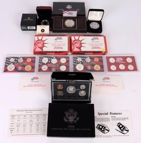 ASSORTED SILVER COMMEMORATIVE COIN SETS - (6)