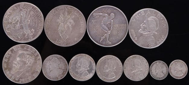 ASSORTED VINTAGE FOREIGN SILVER COINS - (11)