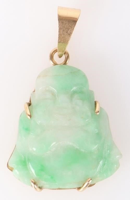 18K SMOKY JADE BUDDHA PENDANT: 18K smoky jade Buddha pendant. Seated laughing Buddha cradled in gold.Stone Type: JadeWeight: 3.78 gramsSize: 0.75"Condition: Very fine.