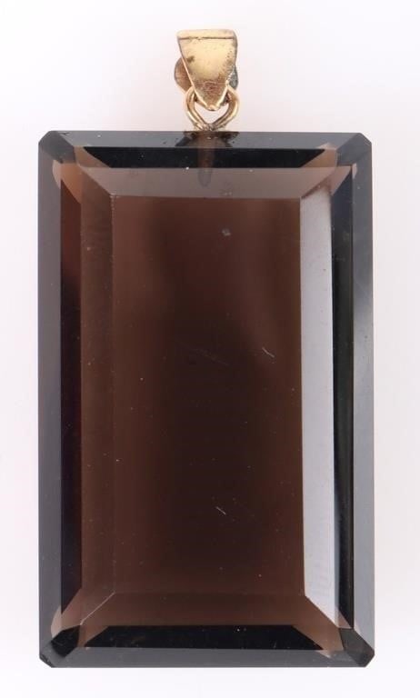 VINTAGE BLUE/GREEN SPINEL GEMSTONE PENDANT: Vintage chocolate colored spinel gemstone pendant. Stone Type: Spinel Weight: 61.30 CT Condition: Very fine. See images.