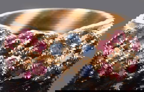 RUBY, SAPPHIRE & DIAMOND 14K YELLOW GOLD RING: 14K yellow gold ruby, sapphire, and diamond ladies ring with six 0.05CT round sapphires, twelve 0.05CT round rubies, and three 0.03CT round diamonds. All gemstones are in a flower design.Stone Type: A