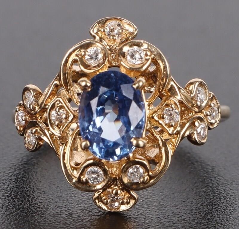 SAPPHIRE & DIAMOND 14K YELLOW GOLD LADIES RING: Sapphire and diamond 14K yellow gold ladies ring with one 0.75CT blue sapphire and fourteen 0.02CT round diamonds. Stone Type: Sapphire Weight: 4.22 Grams Size: US 4.75 Condition: Very fine.