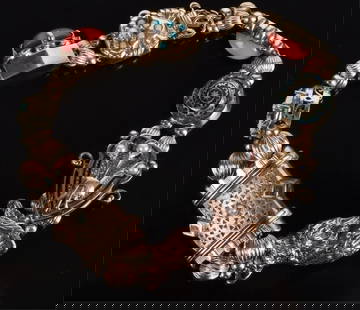 ANTIQUE 14K YELLOW GOLD CHARM SLIDE BRACELET: Antique Victorian-style 14K yellow gold ladies charm bracelet with coral, opal, jasper and pearls.Stone Type: AssortedWeight: 32.66 GramsSize: 7.5" lengthCondition: Very fine.