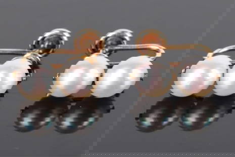 14K YELLOW GOLD WHITE PEARL LADIES EARRINGS: 14K yellow gold white pearl ladies earrings with four ~7.0mm white pearls.Stone Type: PearlWeight: 3.38 GramsSize: 0.75" LengthCondition: Very fine.