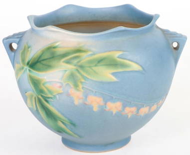 ROSEVILLE POTTERY BLUE BLEEDING HEART JARDINIERE: Vintage Roseville pottery blue bleeding heart Jardiniere planter 651-4.Size: 7.0" TallCondition: Very fine.