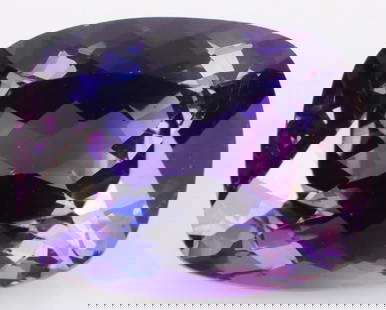 LARGE 17.55CT BI-COLOR SAPPHIRE LOOSE GEMSTONE: Large 17.55ct cushion-cut bi-color blue and purple Sapphire loose semi-precious gemstone. Gemstone has been electronically tested and identified, tester does not distinguish between natural and lab gr