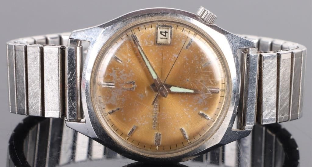 BULOVA ACCUTRON STAINLESS STEEL WRIST WATCH: Vintage Bulova Accutron Stainless Steel Wristwatch. Case Marked Bulova patented, C121960 M7.Stainless steel Wristwatch Bulova MensSize: 32mmCondition: Signs of physical wear on face of watch. Still in
