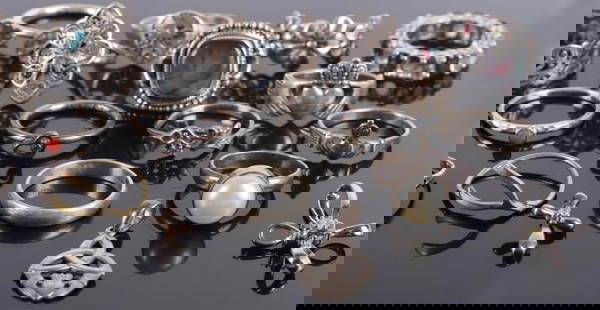 STERLING SILVER LADIES JEWELRY MIXED LOT OF 37: Sterling silver ladies jewelry mixed lot of 37 to include: 32 sterling silver rings various sizes, 3 sterling silver pendants. 1 pair sterling silver sand dollar earrings and a 17.5" necklace.Weight: