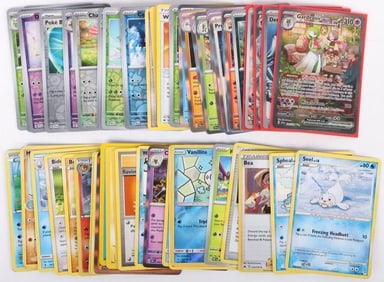 NM POKEMON ASSORTED CARDS LOT OF 57