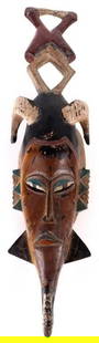 HAND-CARVED AFRICAN WOODEN GURU TRIBAL MASK: Hand-carved African wooden Guru tribal mask. African masks were used in a wide variety of ceremonies, rituals, and cultural practices, serving as conduits for communication with spirits, ancestors, an