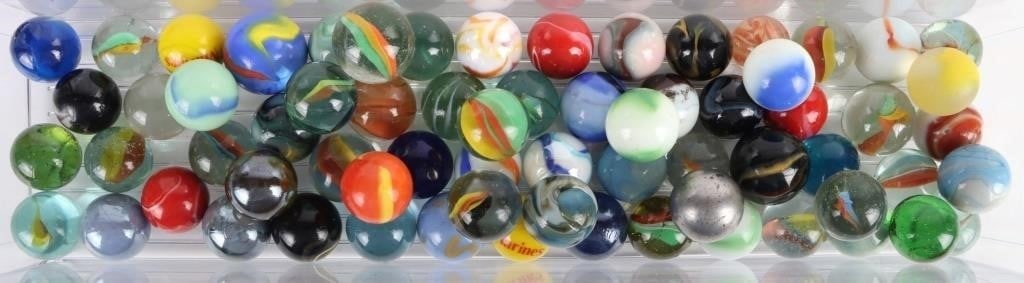 24-30MM VINTAGE ART GLASS MARBLE COLLECTION: 24-30mm vintage art glass marble collection to include approximately 70 marbles, each with their own unique designs are features. Collection includes classic to more unique styles, swirls, iridescent,