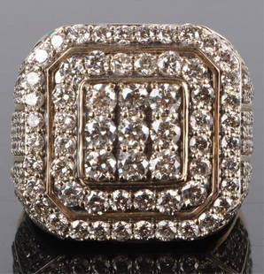 ~6.12CTW NATURAL DIAMOND & 10K MEN'S RING: ~6.12CTW natural diamond and 10K yellow gold men's ring.Stone Type: DiamondWeight: 14.0 GramsSize: 10Condition: Very fine
