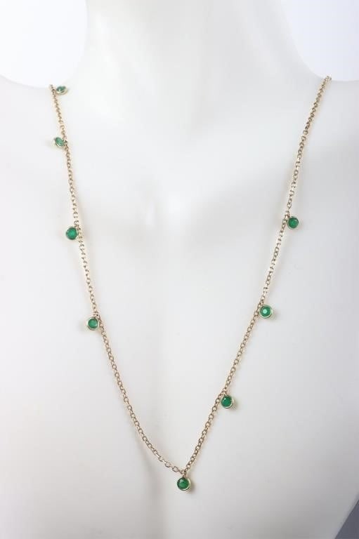 14K YELLOW GOLD LADIES NECKLACE W/ 8 EMERALDS: 14k gold ladies necklace with eight emeralds.Stone Type: EmeraldWeight: 3.31Size: 19.5" longCondition: Very fine, knot on one end.