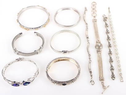 VINTAGE SILVER-TONE LADIES BRACELET LOT OF 10: Vintage silver-tone ladies bracelet lot of 10 to include: one rope cuff bracelet, 5 bangle bracelets with various rhinestones, a rhinestone and flower tennis bracelet, two link bracelets and a three-s