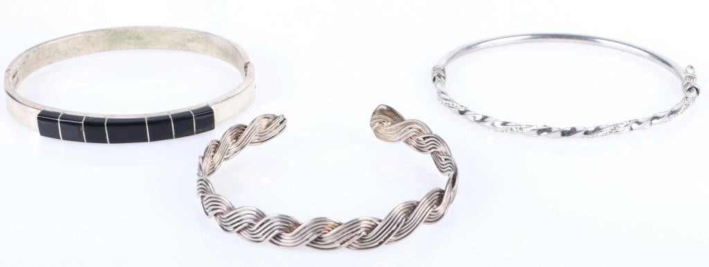 STERLING SILVER LADIES BRACELETS - LOT OF 3: Sterling silver ladies bracelets. - lot of 3. To include one with onyx detailing.Stone Type: OnyxWeight: 47.82 GramsSize: 8.0" lengthCondition: Very fine.