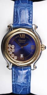 CHOPARD 'HAPPY SPORT' BLUE LADIES WRISTWATCH: Chopard " Happy Sport" blue ladies wristwatch with quartz movement. The round stainless steel & gold case with signed blue dial with gold enamel Roman numeral hour markers, outer seconds' register, da
