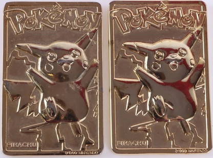 1999 PIKACHU 23K GOLD PLATED TRADING CARD LOT OF 2: 1999 Pikachu 23K Gold Plated Promo trading card lot of 2.Condition: NM- NM+ Non-sports cards