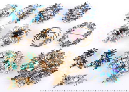 VINTAGE LADIES BROOCH & CLIP ON EARRINGS LOT OF 9: Vintage ladies brooches & clip on earrings lot of 9. This lot contains 5 beautiful brooches of different styles and various colors and 4 sets of clip on earrings.Stone Type: CZWeight: 138.2 Grams tota