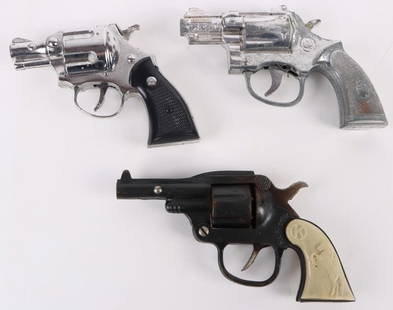 VINTAGE DIE-CAST CAPGUN REVOLVERS LOT OF 3: Vintage die-cast revolver capguns lot of three. Two chrome die-cast and one cast iron capguns.Condition: Wear commensurate with age.