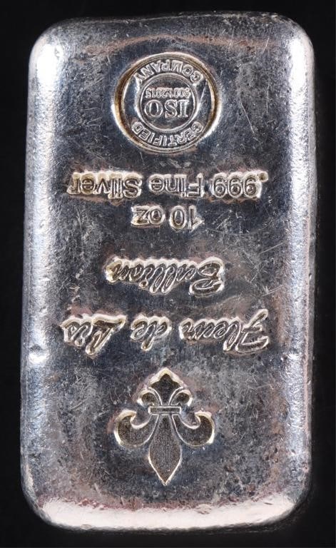 .999 FINE SILVER FLEUR DE LIS 10 T-OZ. BULLION ISO: .999 Fine Silver Fleur de Lis 10 Troy ounce Bullion ISO Certified Stamp. Weight: 10 Ozt. Condition: Very fine. See images.