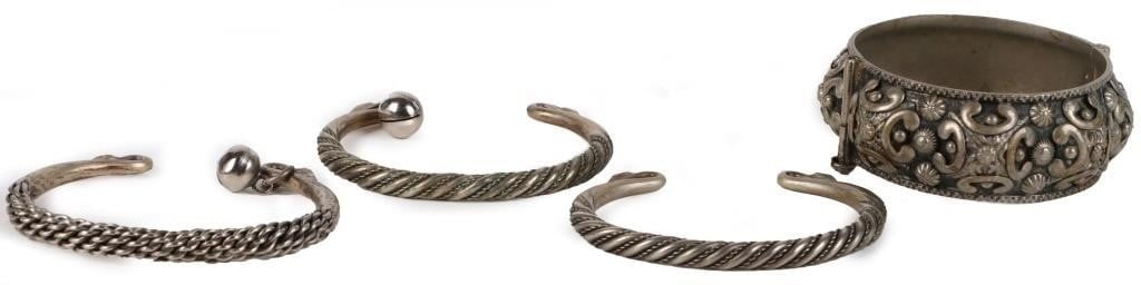 BRUTALIST-STYLE ANTIQUE SILVER-PLATED BRACELETS: Brutalist-style antique silver-plated bracelets to include one large intricate bangle bracelet, two cuff bracelets with bells, and one additional cuff bracelet. Lot of 4.Size: 8.0" largestCondition: W