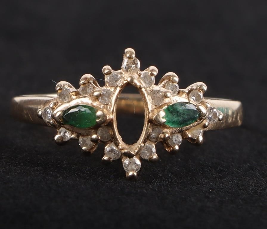 14K YELLOW GOLD EMERLALD DIAMOND RING SETTING: 14K yellow gold emerald diamond ring setting with fifteen 0.01ct round diamonds and two 0.03ct marquise emeralds.Stone Type: AssortedWeight: 2.45 GramsSize: US 8Condition: See pictures.