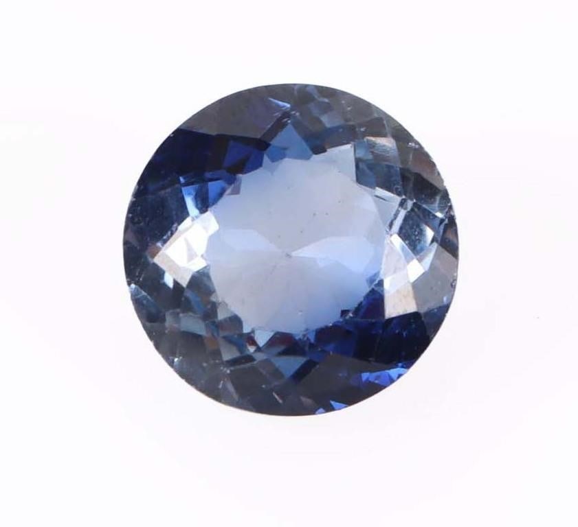 10.35CT BICOLOR LIGHT AND NAVY SAPPHIRE LOOSE GEM: 10.35CT bicolor light and navy blue sapphire loose round-cut sapphire. Electronically verified to be a sapphire, though whether it is natural or lab-grown has not been determined.Stone Type: SapphireS