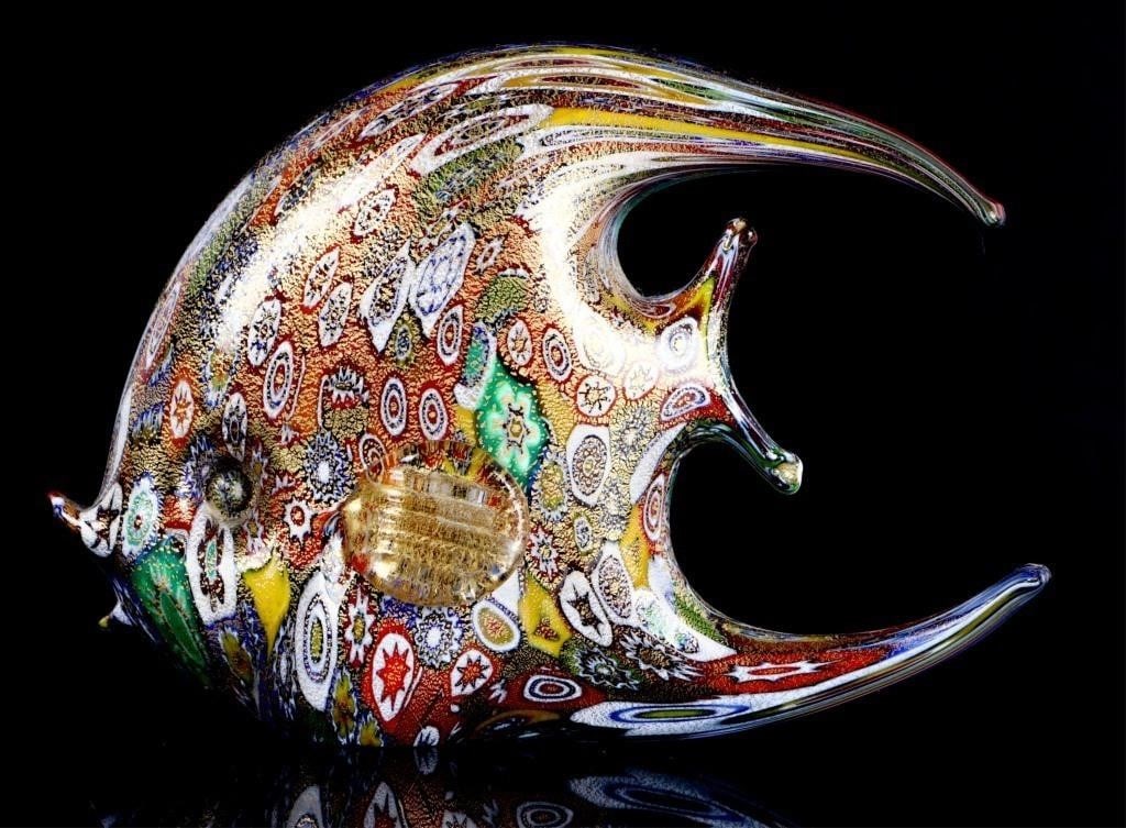 MURANO GLASS GOLDEN QUILT MILLEFIORI FISH: Murano glass golden quilt millefiori fish sculpture. This sculpture is beautifully designed in reds, oranges, greens, yellows and white. It was hand made in Italy. Size: 3" x 4.25" Condition: Very fin