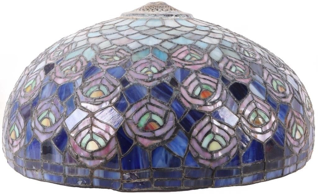 VINTAGE TIFFANY STYLE PEACOCK INSPIRED LAMP SHADE: Vintage Tiffany style peacock inspired stained glass chandelier lamp shade. Shade has beautiful purple, blue, green and yellow cut glass.Size: 18" DiameterCondition: Wear commensurate with age, some c