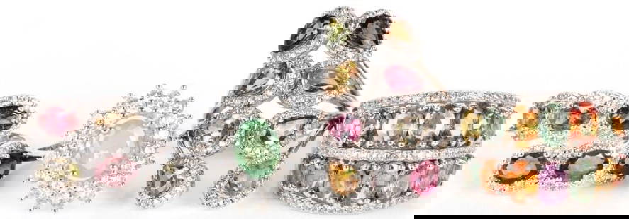 BEAUTIFUL STERLING VARIOUS GEMSTONE RINGS LOT OF 4: Beautiful assorted sterling silver gemstone ladies rings lot of 4 to include: Amethyst, Tourmaline, White Topaz, Multi-color Sapphire.Stone Type: AssortedWeight: 23.8 GramsSize: 5.0,6.0,7.0Condition: