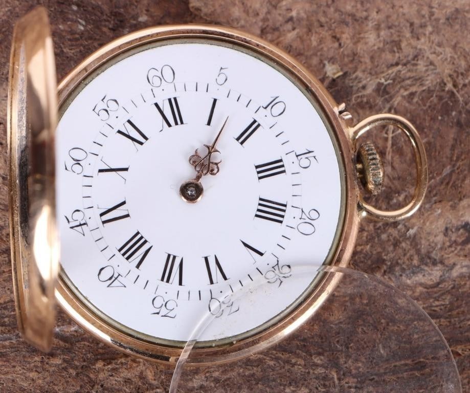 YELLOW GOLD-FILLED POCKET WATCH: Antique yellow gold-filled pocket watch with an unknown number of jewels and from an unknown company.Gold filled LadiesWeight: 29.23 gramsSize: 34.3mmCondition: The glass face and the minute hand are