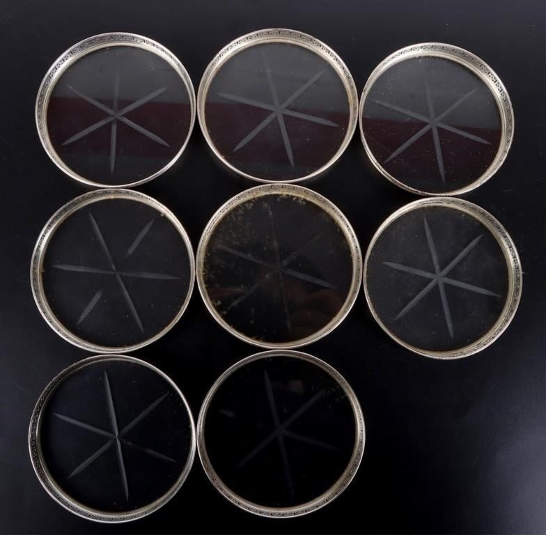 VINTAGE WEBSTER CO STERLING & GLASS COASTERS (8): Vintage Webster Co sterling silver and etched glass coaster set of 8.Weight: 29.91 Grams eachSize: 31/8 DCondition: No dents or cracks. Very little surface wear. See images for complete condition.