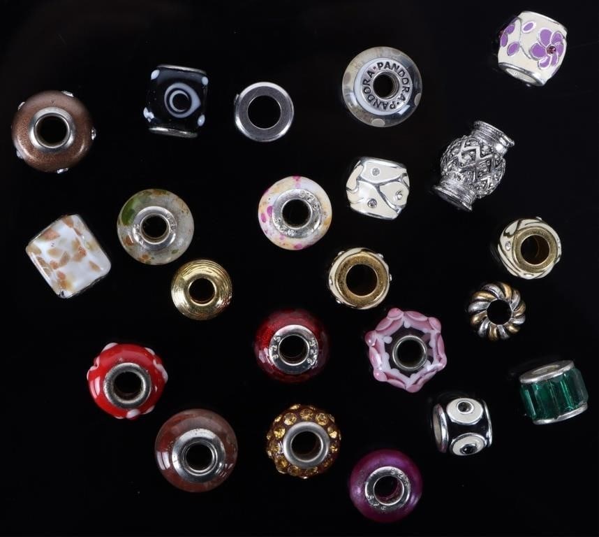 VARIOUS GLASS BEAD BRACELET CHARMS (22): Various glass bead bracelet charms (22). The charms come in various styles & colors. Not all beads are Pandora.Weight: 63.52 GramsCondition: Very Fine