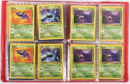 ASSORTED POKEMON CARDS LOT OF 106 INCLUDING BOOK