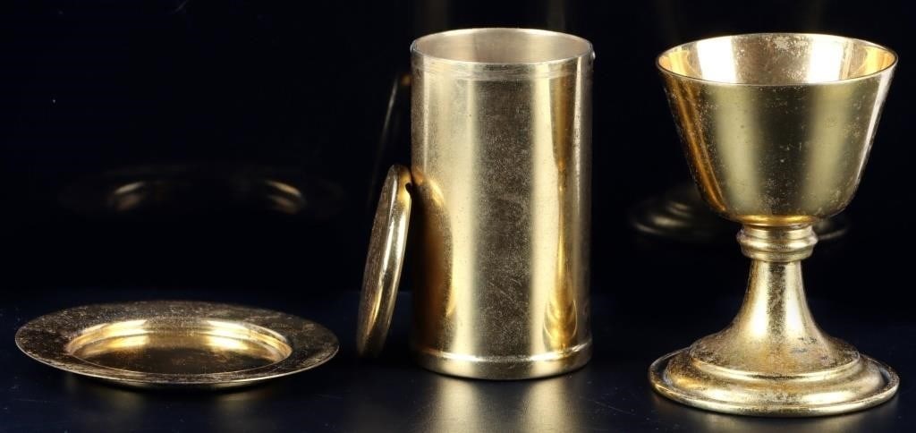 ANTIQUE PORTABLE COMMUNION KIT 10K PLATED: Antique portable communion kit. This was used by Catholic priests when they celebrated Mass while traveling or on behalf of the sick. To include the original box, a 10K gold-plated goblet, a 10K gold-